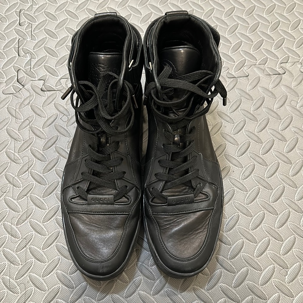 Gucci.  Men’s high tops. Seldom worn.